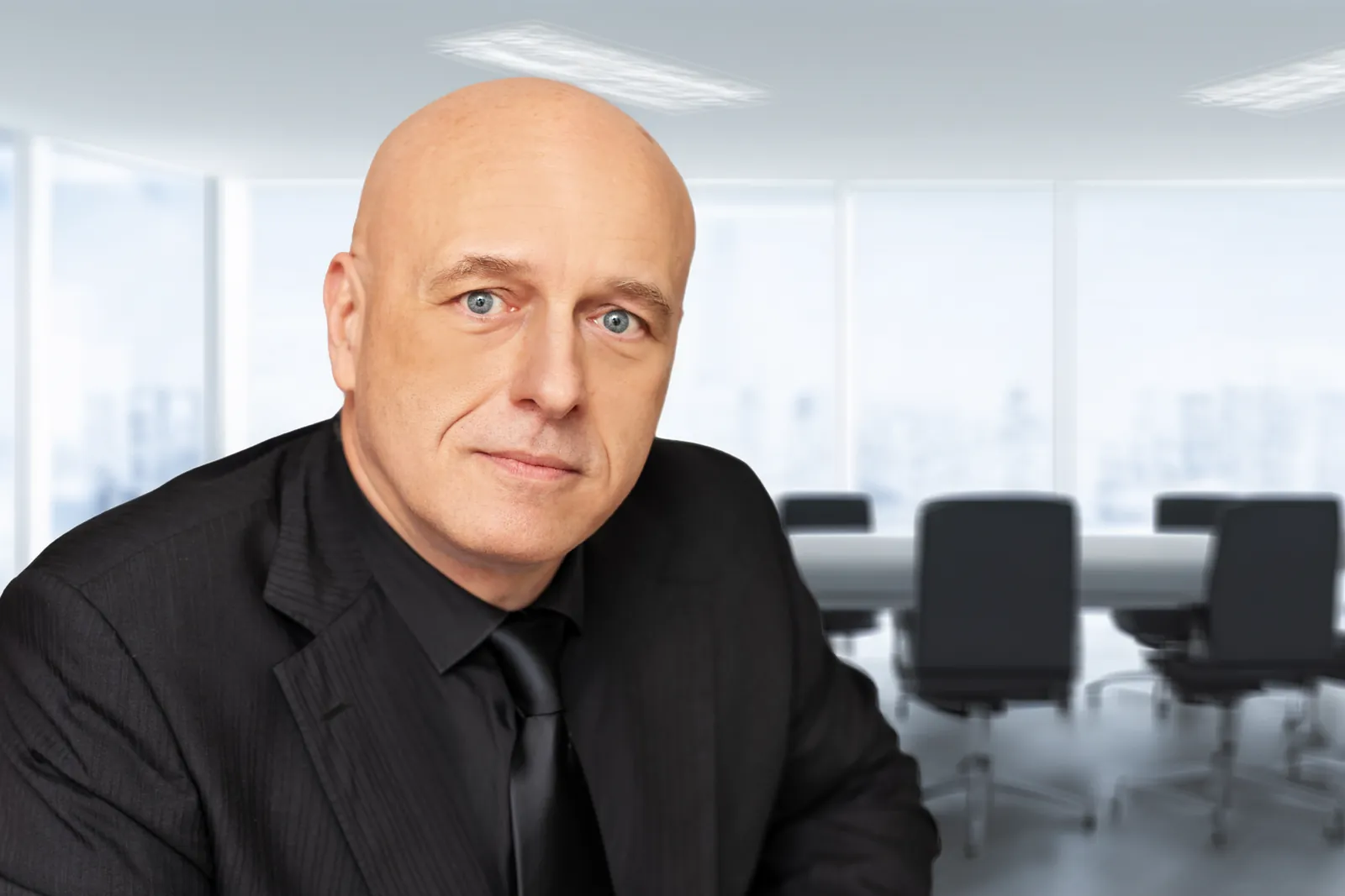 Keith J. Connell in a boardroom
